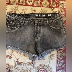 The frayed mid rise denim